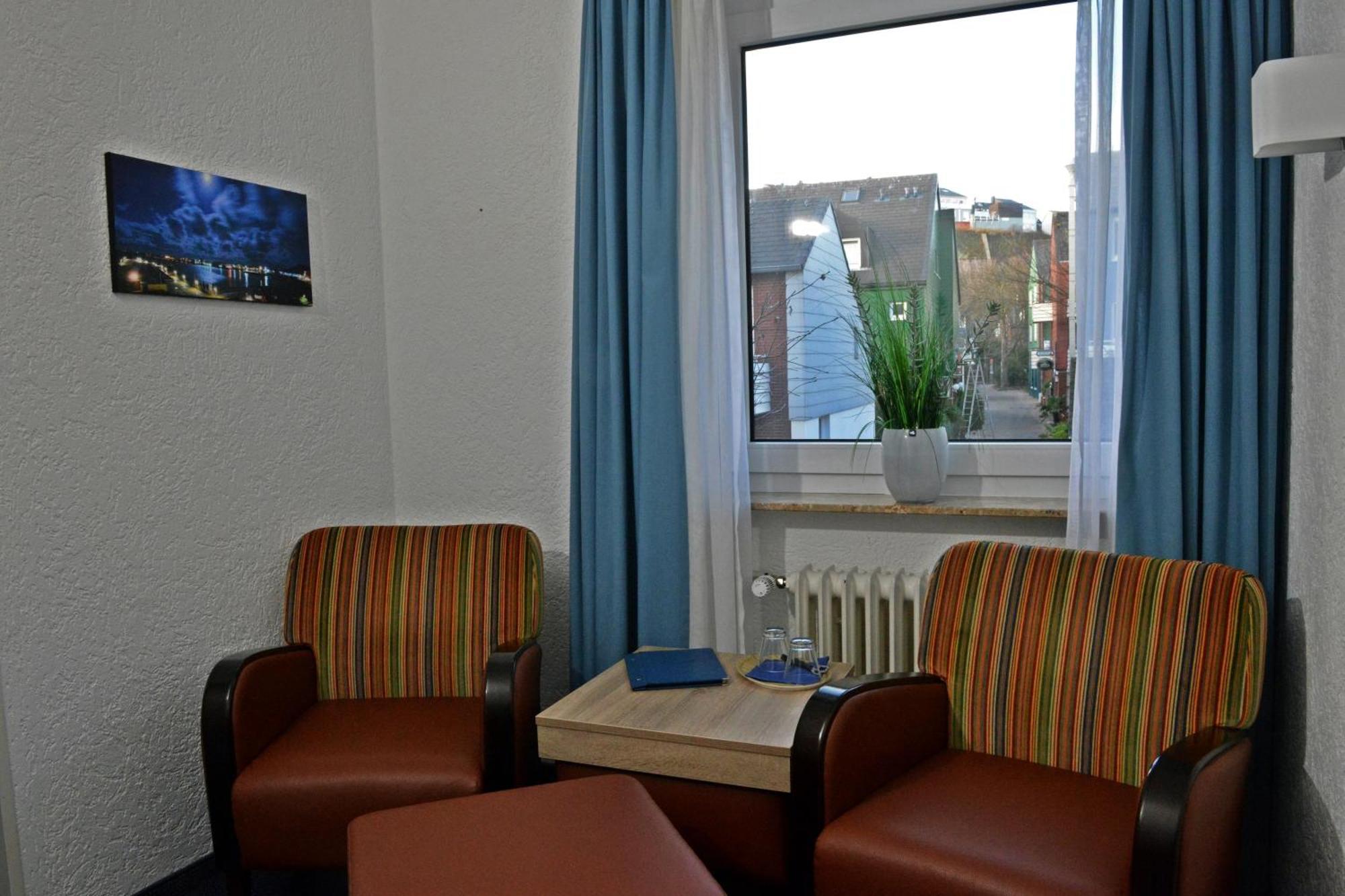 Hotel Quisisana & Appartements Quisi Heligoland Habitación foto