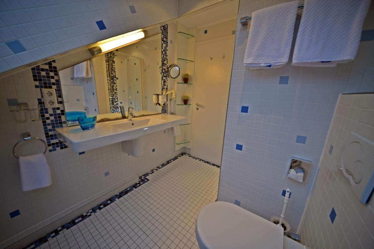 Hotel Quisisana & Appartements Quisi Heligoland Habitación foto